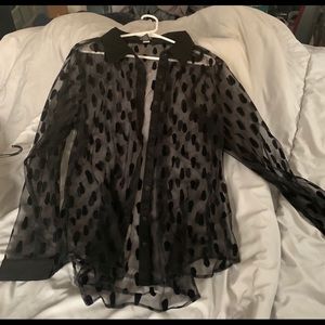 Sheer black blouse with coffins